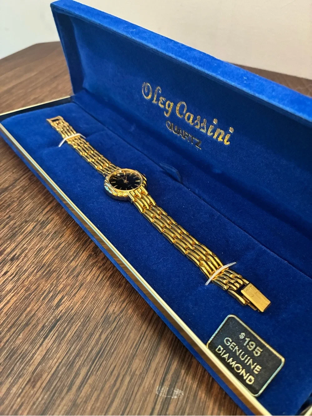 Oleg Cassini Swiss Quartz & Diamond Watch with Gold Tone Basket Weave Band